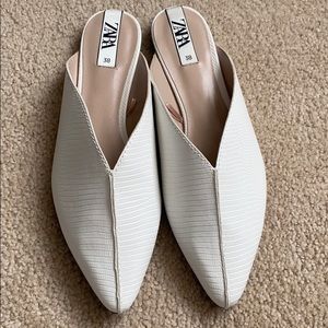 White closed toe flats